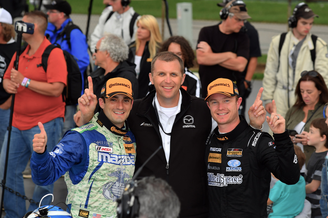 Celebrating our 1-2 with Mazda Motorsports's John Doonan and No. 25 Freedom driver Chad McCumbee.